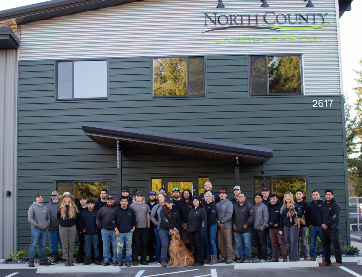 The North County Landscape Co. team outside their shop