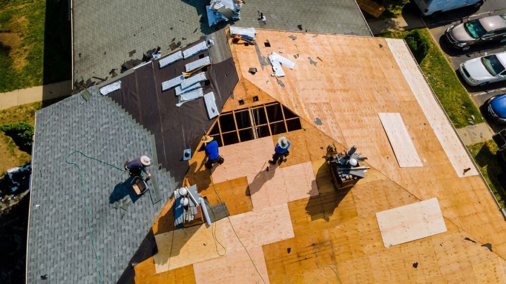 Roofing Experts Roofers working on a roof