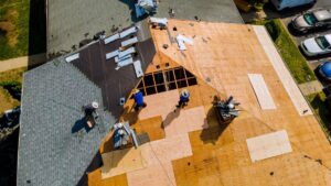 Roofers working on a roof
