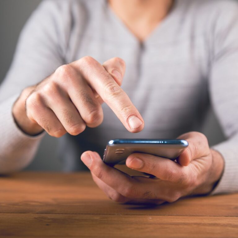 A person clicking something on their phone.