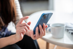 a woman using her smartphone