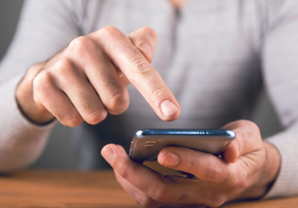 A person clicking something on their phone.
