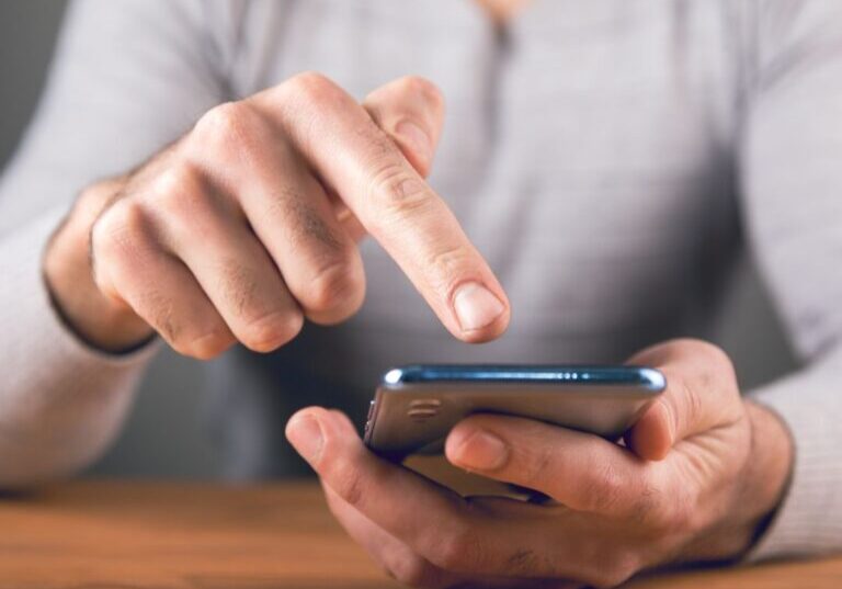 More clicks A person clicking something on their phone.