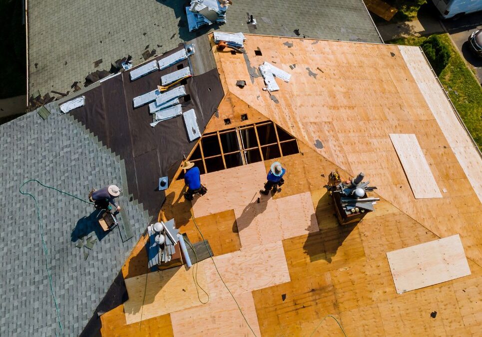 Roofing Experts Roofers working on a roof